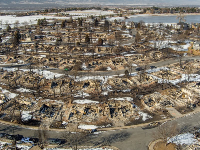 A drone view of a neighborhood destroyed by the Marshall fire, which was attributed to an unmoored Xcel Energy power line