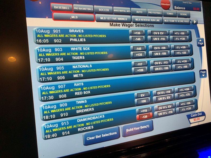 A screen shows wager selections for an MLB team