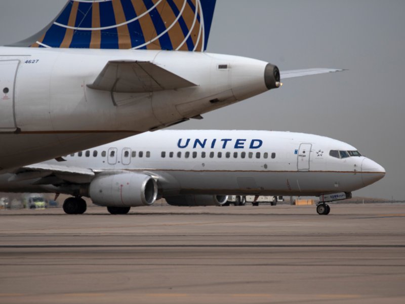 A United plane on the tarmac at an airport